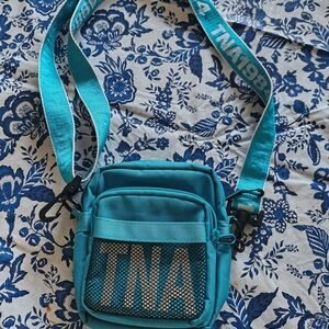 TNA Turquoise Crossbody Bag with Mesh Pocket